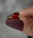 Square-cut red Garnet ring in gold prongs from the January birthstone collection.
