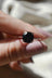 Silver ring with square black Onyx gemstone, showcasing its mental healing properties.