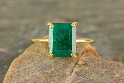 Exploring Alternative Engagement Rings Featuring Natural Emerald and Asher Cuts