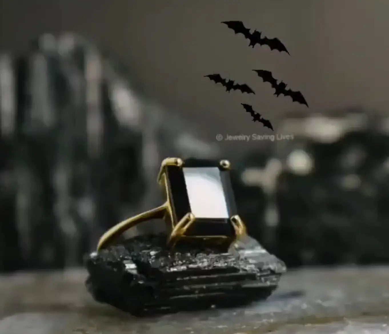 Gold ring with a black crystal featured in JSL Halloween Giveaway 2021.