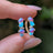 The Legacy Earrings - Blue and Purple Opal Hoops