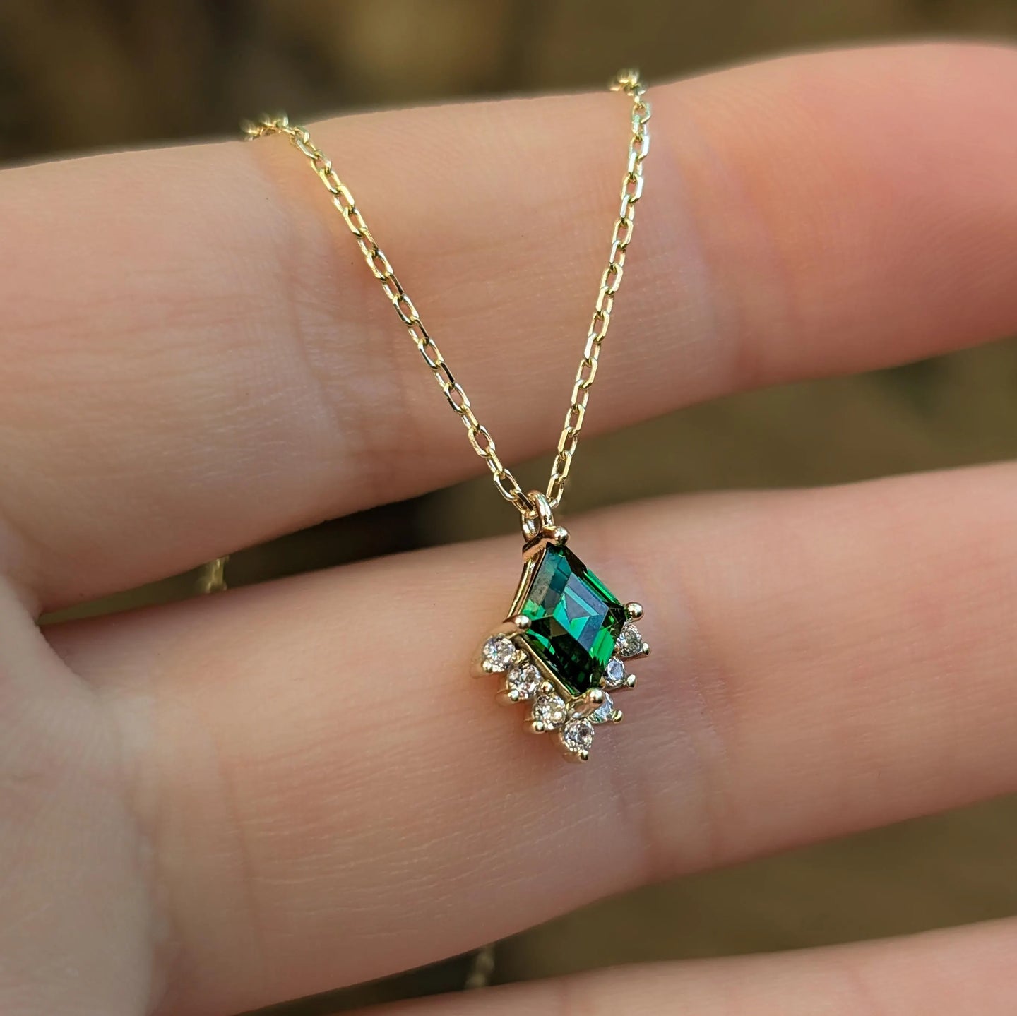 Kite Shaped Emerald Half Halo Pendant Necklace