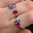 The Tulia - Bisexual 3 Stone Cluster Ring