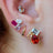 The Tulia - Lesbian Flag Cluster Studs