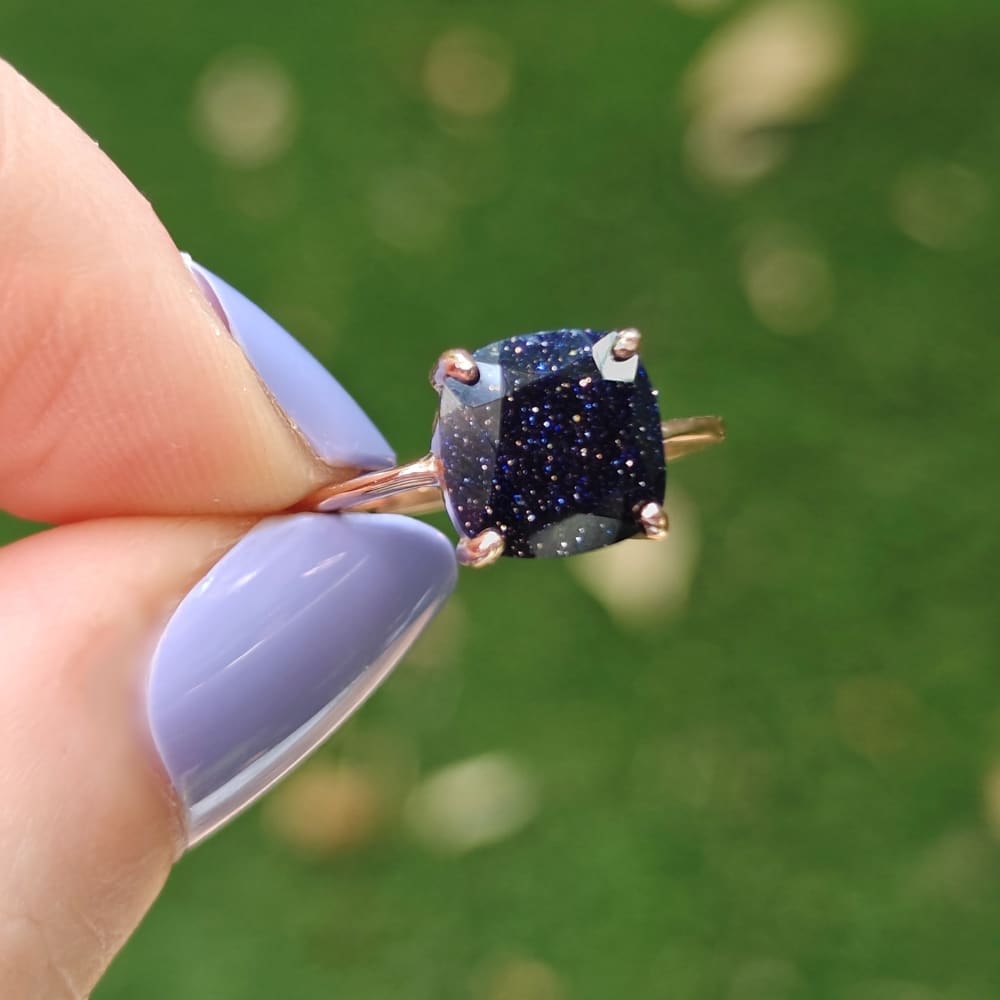 Square-cut Blue Goldstone ring in prong settings, featuring stunning blue sandstone