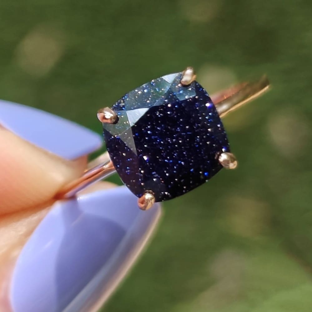 Dark blue sparkly Blue Sandstone ring with gold prongs, The Asher design