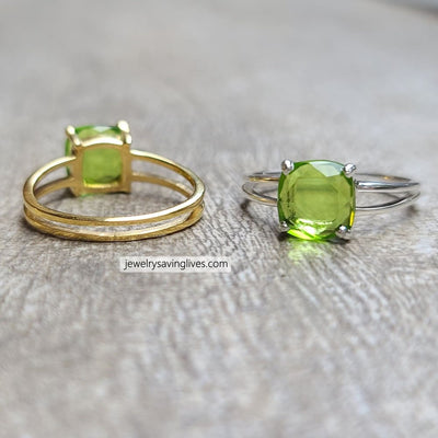 Two rings showcasing natural peridot in gold and silver double band settings