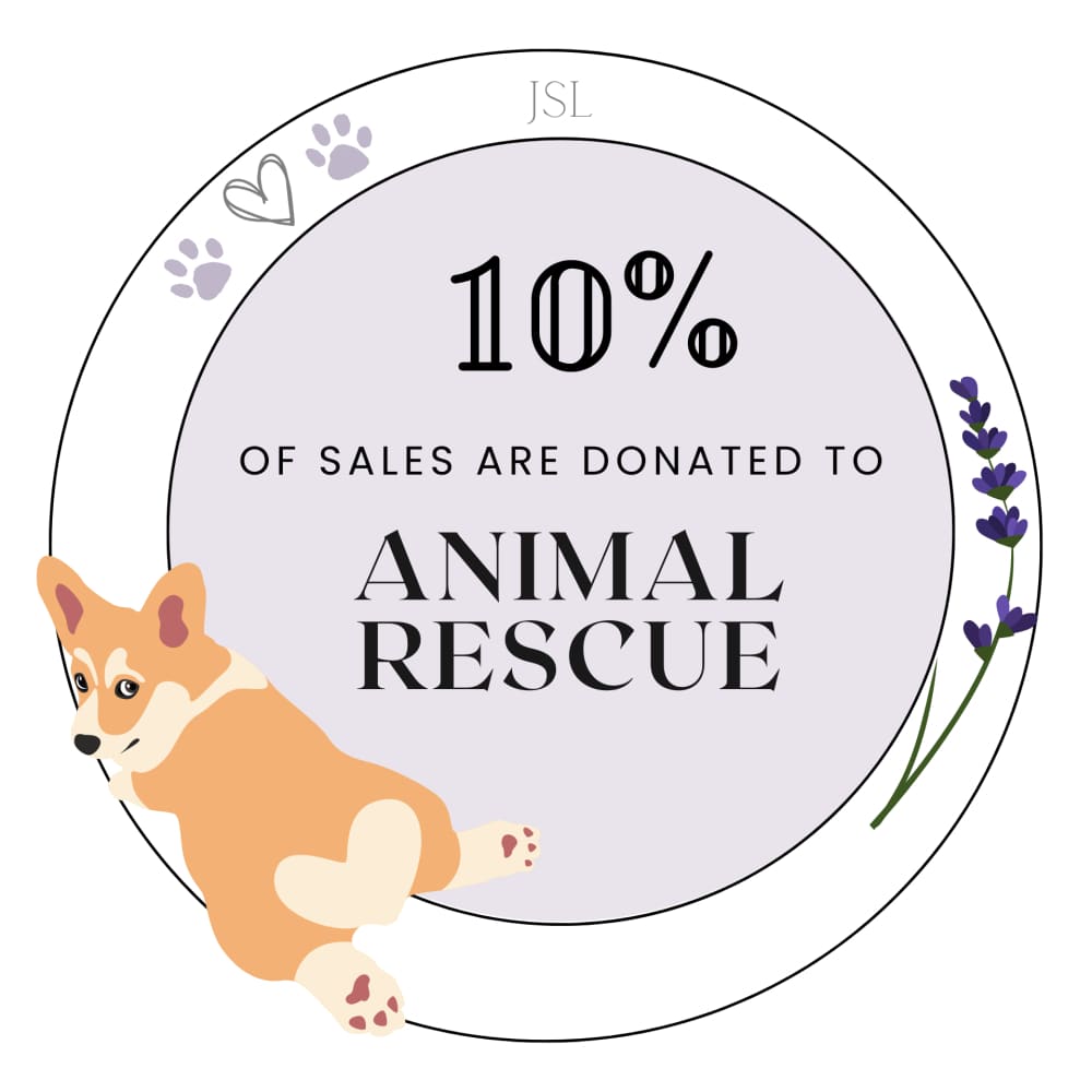 Circular badge for The Asher Natural Aquamarine, highlighting 10% donation to animal rescue