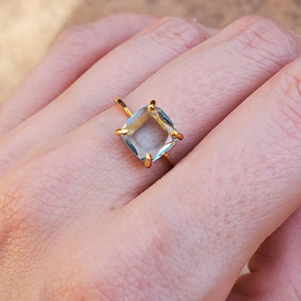 Gold ring with an 8x8mm natural aquamarine in a prong setting, The Asher