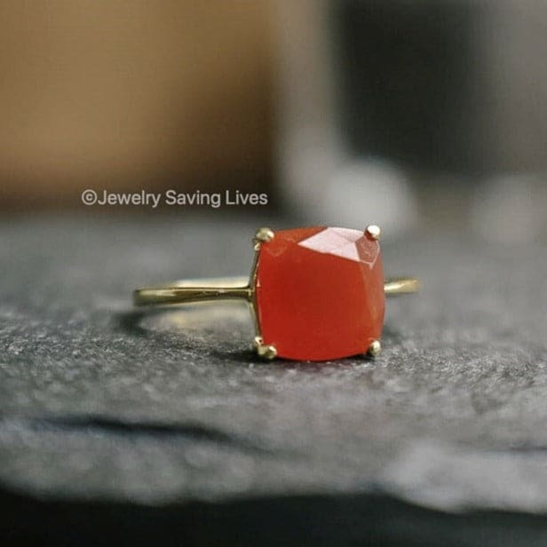 Gold ring with cushion-cut natural carnelian gem in prong setting, The Asher